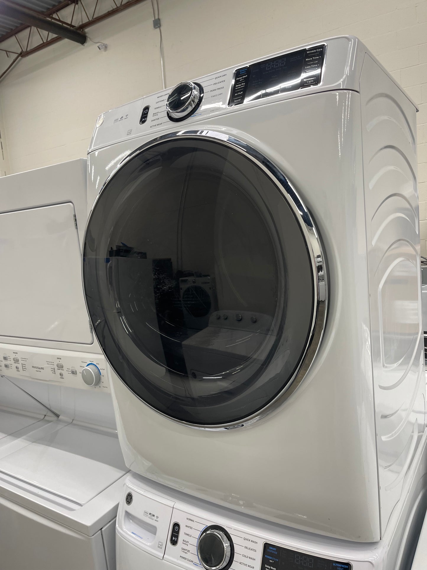 GE GFW650SSNWW Front Load Washer & GFD65ESSNWW Electric Dryer