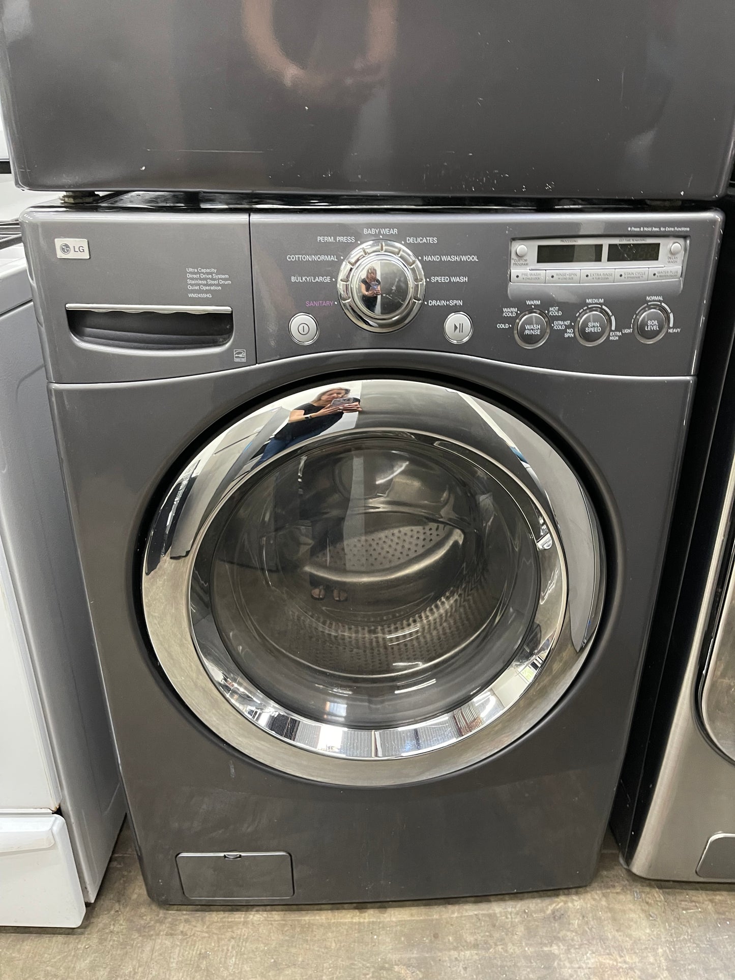 LG  WM2455HG
27 Inch Front-Load Washer with 4.2 cu. ft. Capacity and LG  DLE5955G
27 Inch Electric Dryer with 7.3 cu. ft. Capacity