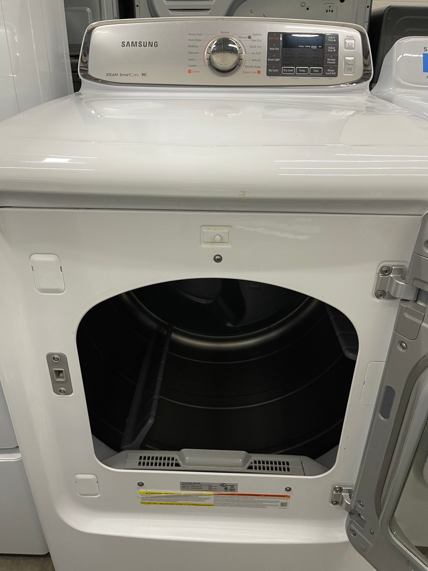 Samsung  DV50F9A6EVW
27 Inch Electric Dryer with 7.4 cu. ft. Capacity, 13 Drying Cycles, Dryer Rack, Smart Care, LED Controls, Stainless Steel Drum, Reversible Door, Wrinkle Away and Steam
