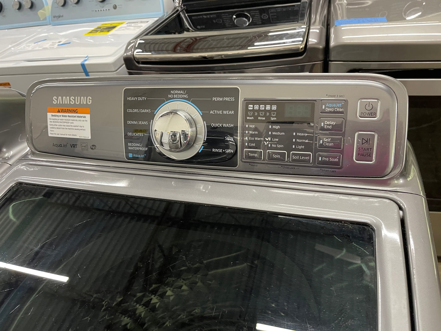 Samsung  WA48H7400AP
27 Inch 4.8 cu. ft. Top Load Washer with 11 Wash Cycles and Samsung  DV48H7400EP
27 Inch 7.4 cu. ft. Electric Dryer with 11 Dry Cycles,