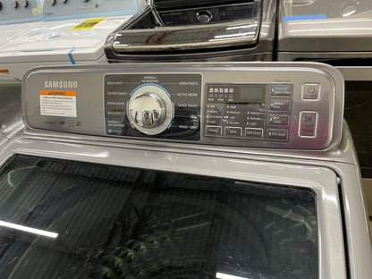 Samsung  WA48H7400AP
27 Inch 4.8 cu. ft. Top Load Washer with 11 Wash Cycles and Samsung  DV48H7400EP
27 Inch 7.4 cu. ft. Electric Dryer with 11 Dry Cycles,