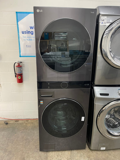 LG WashTower Stacked SMART Laundry Center 4.5 Cu.Ft. Front Load Washer & 7.4 Cu.Ft. Electric Dryer in Black Steel w/ Steam - Used