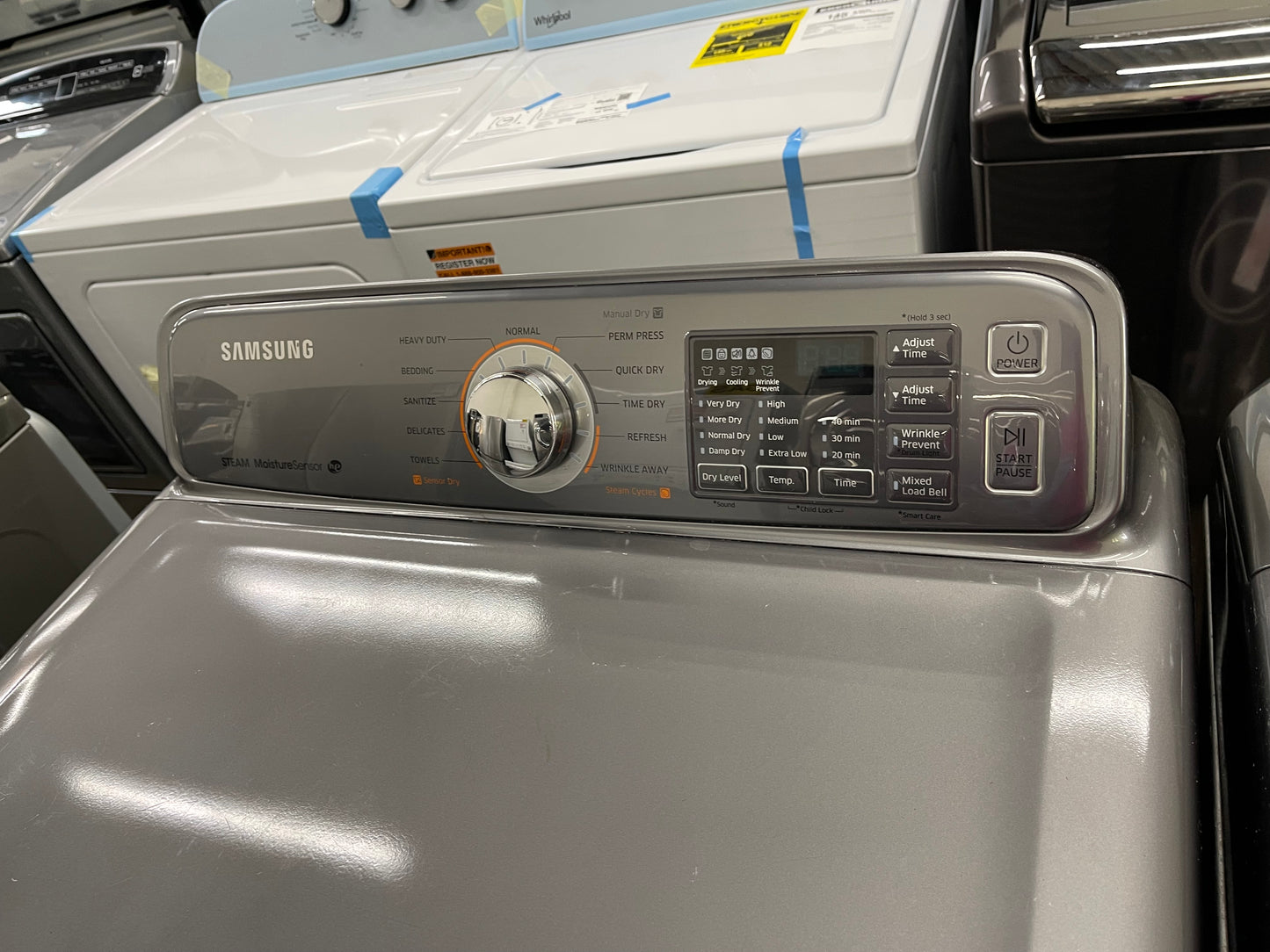 Samsung  WA48H7400AP
27 Inch 4.8 cu. ft. Top Load Washer with 11 Wash Cycles and Samsung  DV48H7400EP
27 Inch 7.4 cu. ft. Electric Dryer with 11 Dry Cycles,