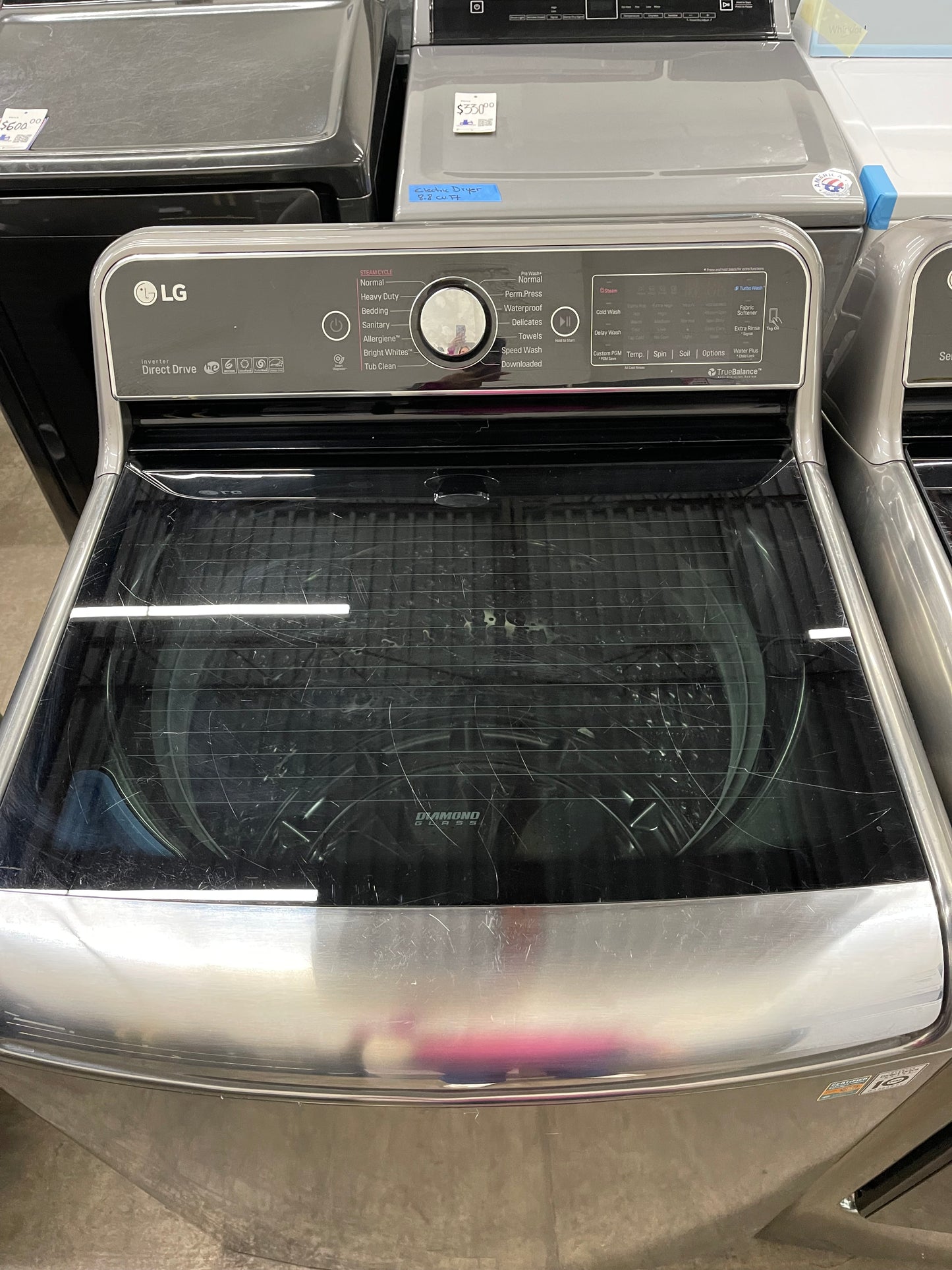 LG TurboWash Series  WT7700HVA
29 Inch 5.7 cu. ft. Top Load Washer with 14 Wash Cycles and LG SteamDryer Series  DLEX7700VE
29 Inch 9.0 cu. ft. Electric Dryer with 14 Drying Cycles