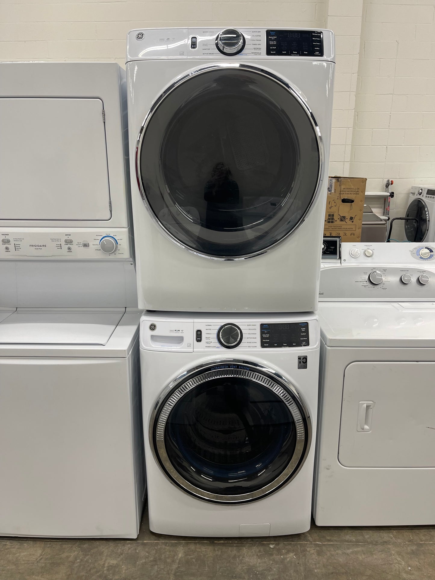GE GFW650SSNWW Front Load Washer & GFD65ESSNWW Electric Dryer