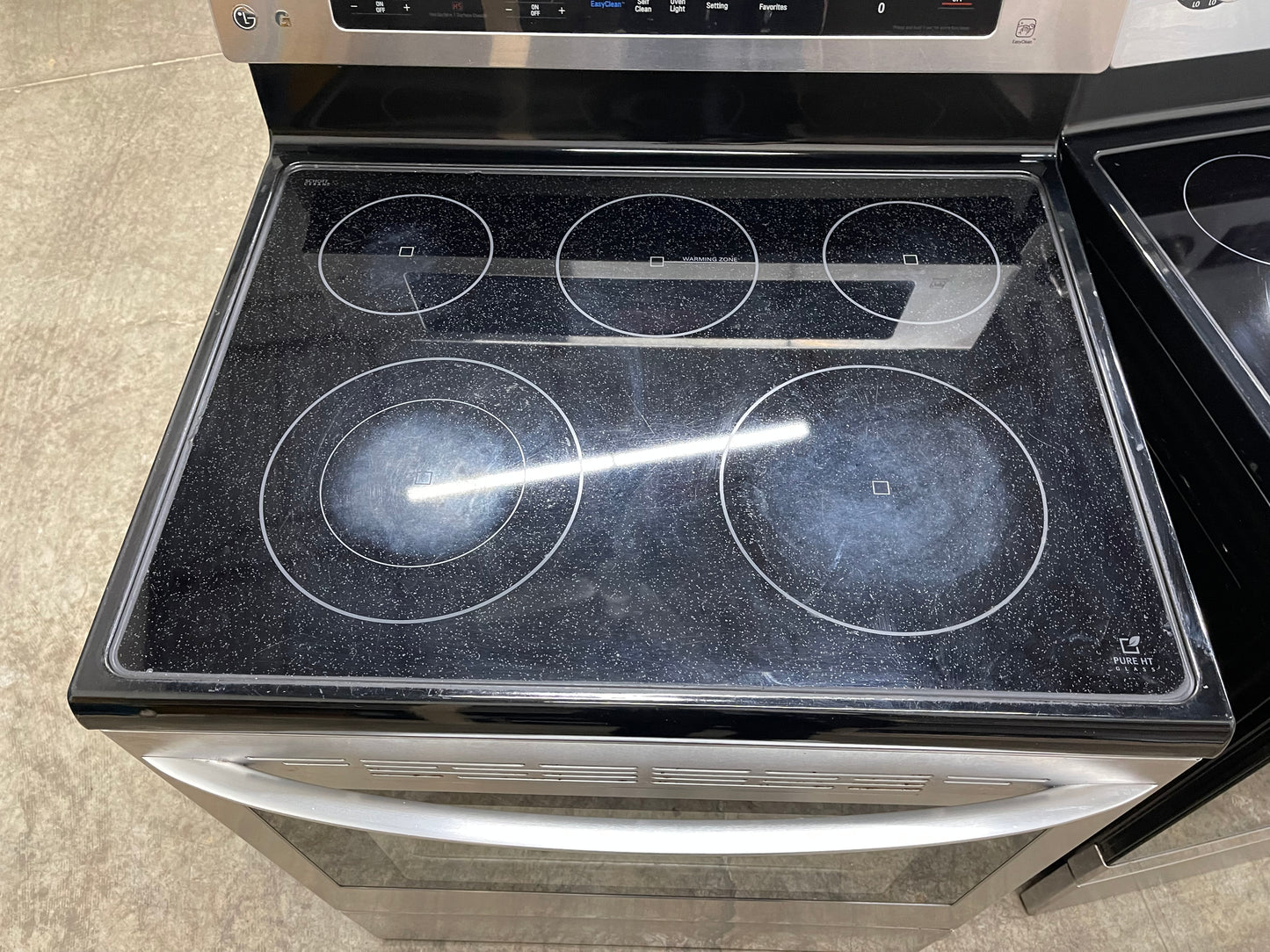 LG  LRE3083ST
30 Inch Electric Range with True Convection, IntuiTouch Controls, EasyClean , 5 Heating Elements, Power Burner, 6.3 cu. ft. Capacity, Brilliant Blue Interior, Storage Drawer and Star-K Certified: Stainless Steel