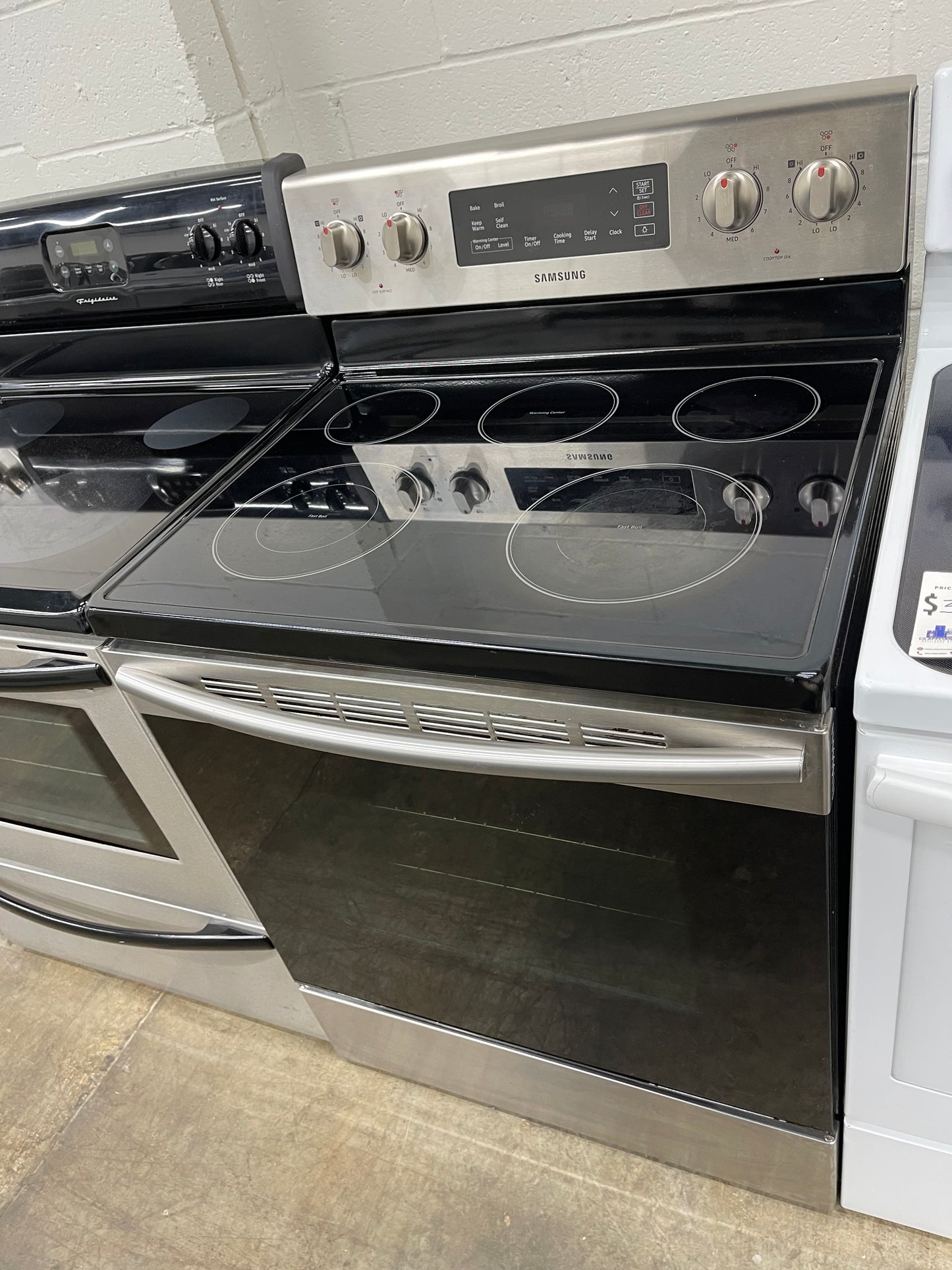 Samsung  NE59M4310SS
30 Inch Freestanding Electric Range with Flexible Cooktop, Dual Elements, Self-Clean, Warming Center, 5 Heating Elements, 5.9 cu. ft. Capacity, Storage Drawer and Sabbath Mode: Stainless Steel