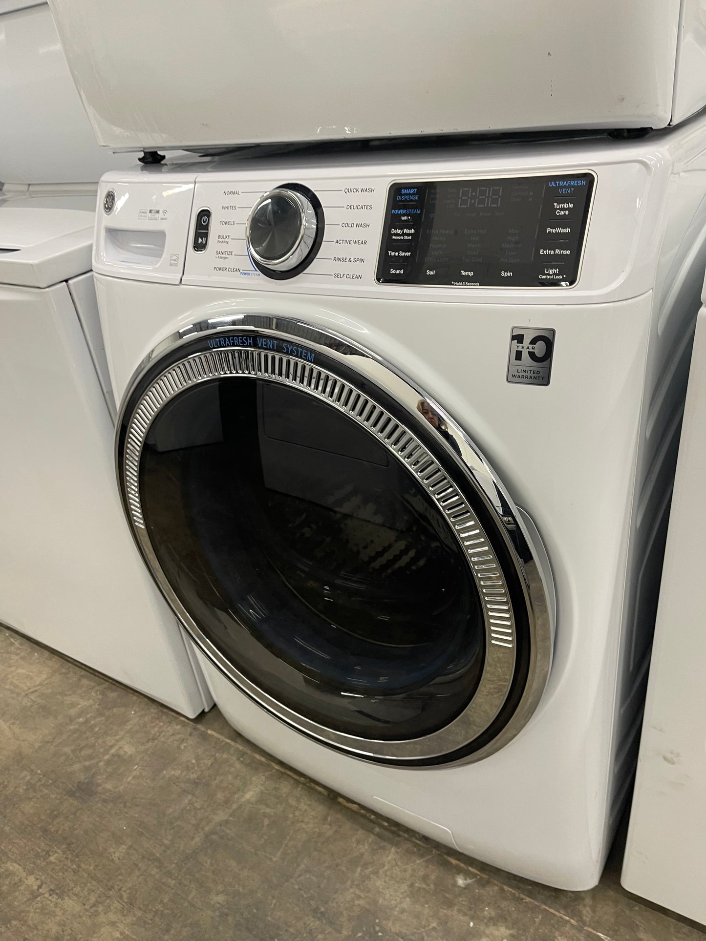 GE GFW650SSNWW Front Load Washer & GFD65ESSNWW Electric Dryer