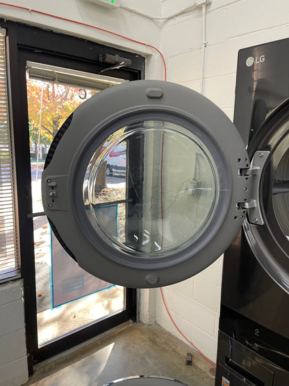 LG WashTower Stacked SMART Laundry Center 4.5 Cu.Ft. Front Load Washer & 7.4 Cu.Ft. Electric Dryer in Black Steel w/ Steam - Used