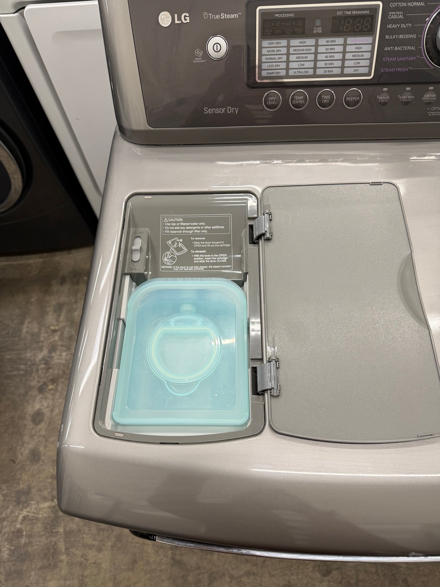 LG Top Load 5.5 Cu. Ft. Washer and 7.3 Cu. Ft. Electric Dryer Set in Black Stainless Steel