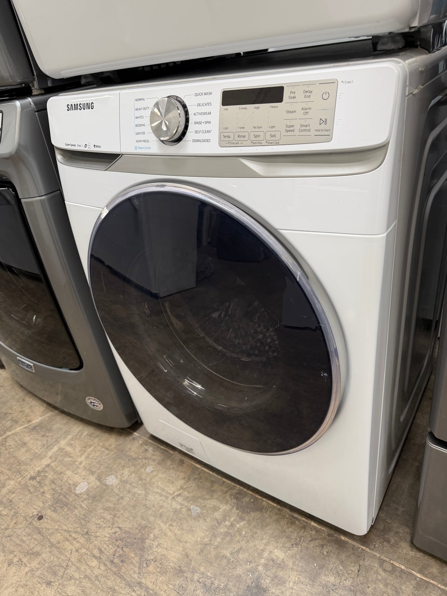 Samsung  WF45R6300AW
27 Inch Front Load Smart Washer with 4.5 Cu. Ft. And Samsung  DVE45R6300W
27 Inch Electric Smart Dryer with 7.5 cu. ft.