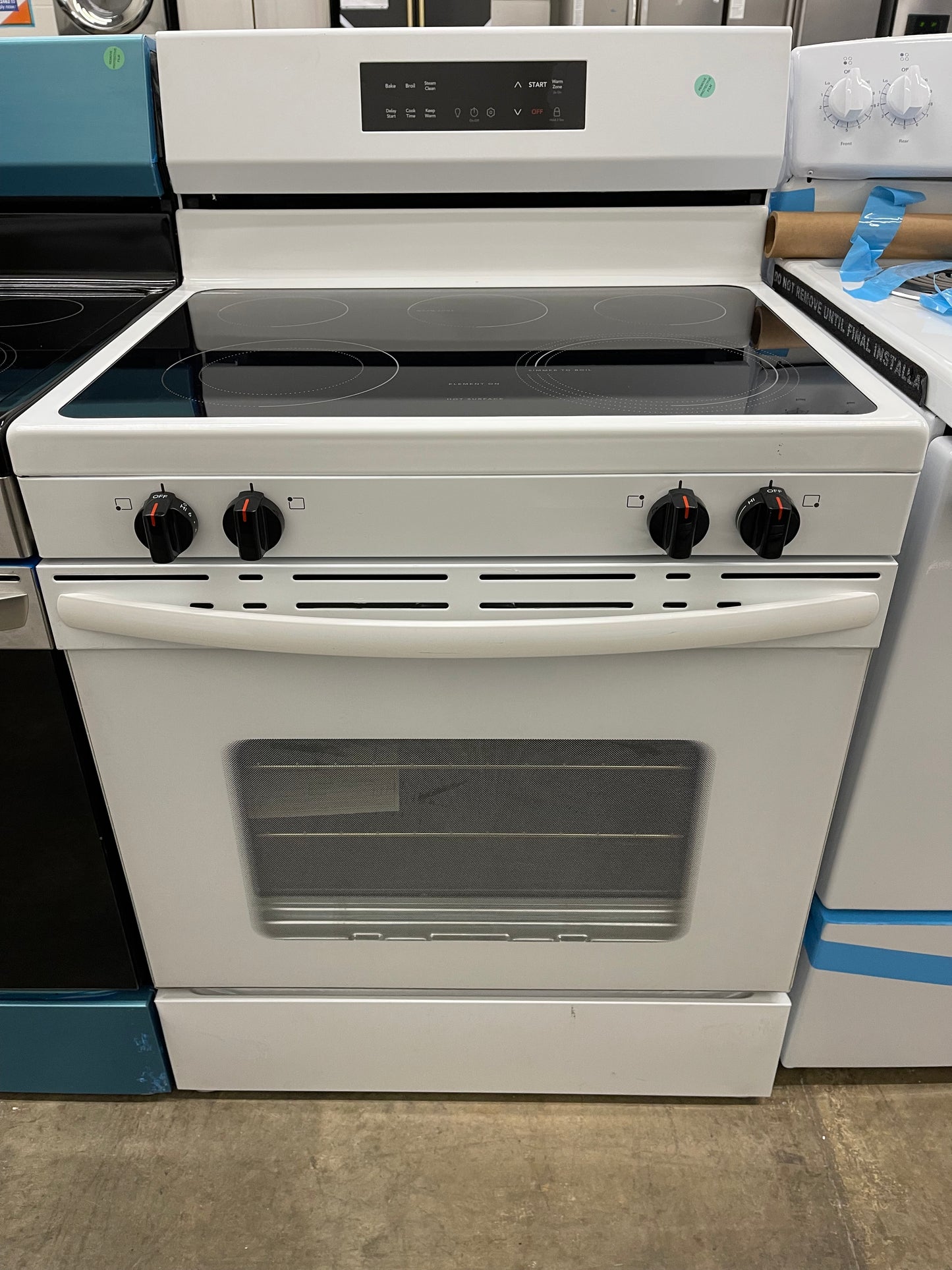 Frigidaire  FCRE3062AW
30 Inch Freestanding Electric Range with 5 Elements, 5.3 cu. ft. Capacity, EvenTemp Element, SpaceWise Element, Storage Drawer, and Steam Clean: White