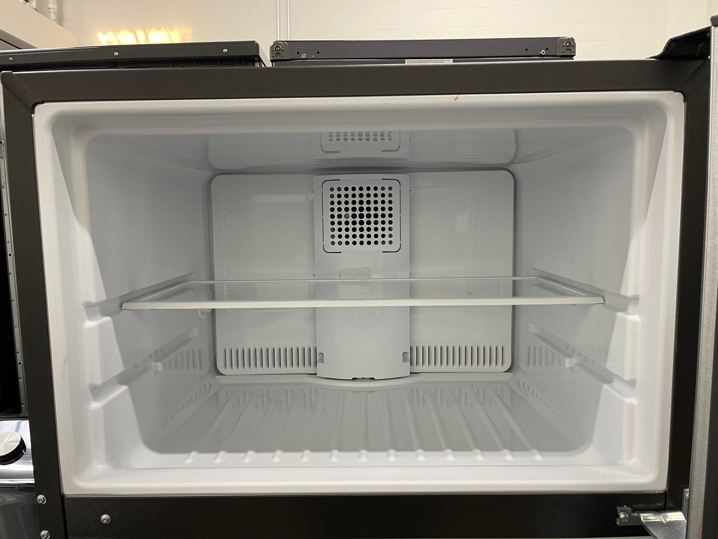 GE  GTS18HYNRFS
28 Inch Top Freezer Refrigerator with 17.5 Cu. Ft. Capacity, Edge-To-Edge Glass Shelves, Sliding Deli Drawer, Gallon Door Bin, Dairy Compartment, LED Lighting, Upfront Temperature Controls, Sabbath Mode, Frost Free, and Icemaker-Ready