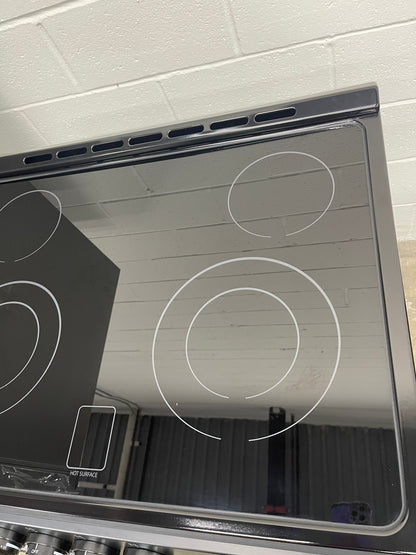 Cosmo 30-in Glass Top 4 burners 5-cu ft Convection Oven Slide-In Electric Range ( Black )
Model #COS-ERD304K-BK