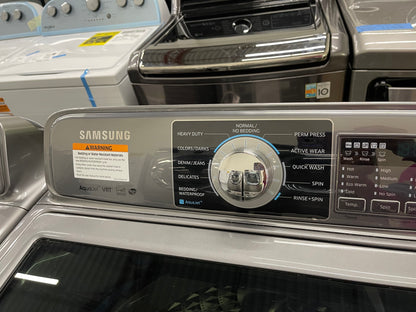 Samsung  WA48H7400AP
27 Inch 4.8 cu. ft. Top Load Washer with 11 Wash Cycles and Samsung  DV48H7400EP
27 Inch 7.4 cu. ft. Electric Dryer with 11 Dry Cycles,