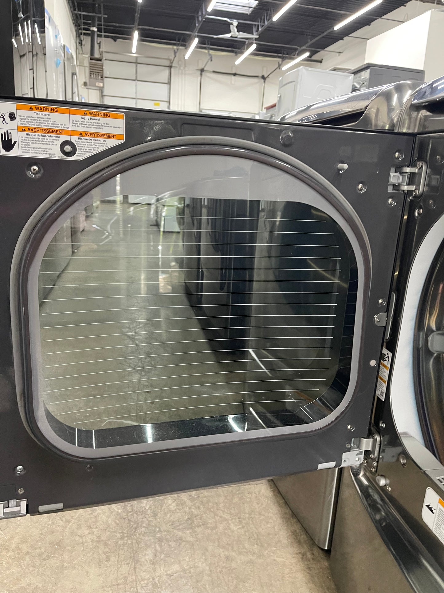 LG TurboWash Series  WT7700HVA
29 Inch 5.7 cu. ft. Top Load Washer with 14 Wash Cycles and LG SteamDryer Series  DLEX7700VE
29 Inch 9.0 cu. ft. Electric Dryer with 14 Drying Cycles