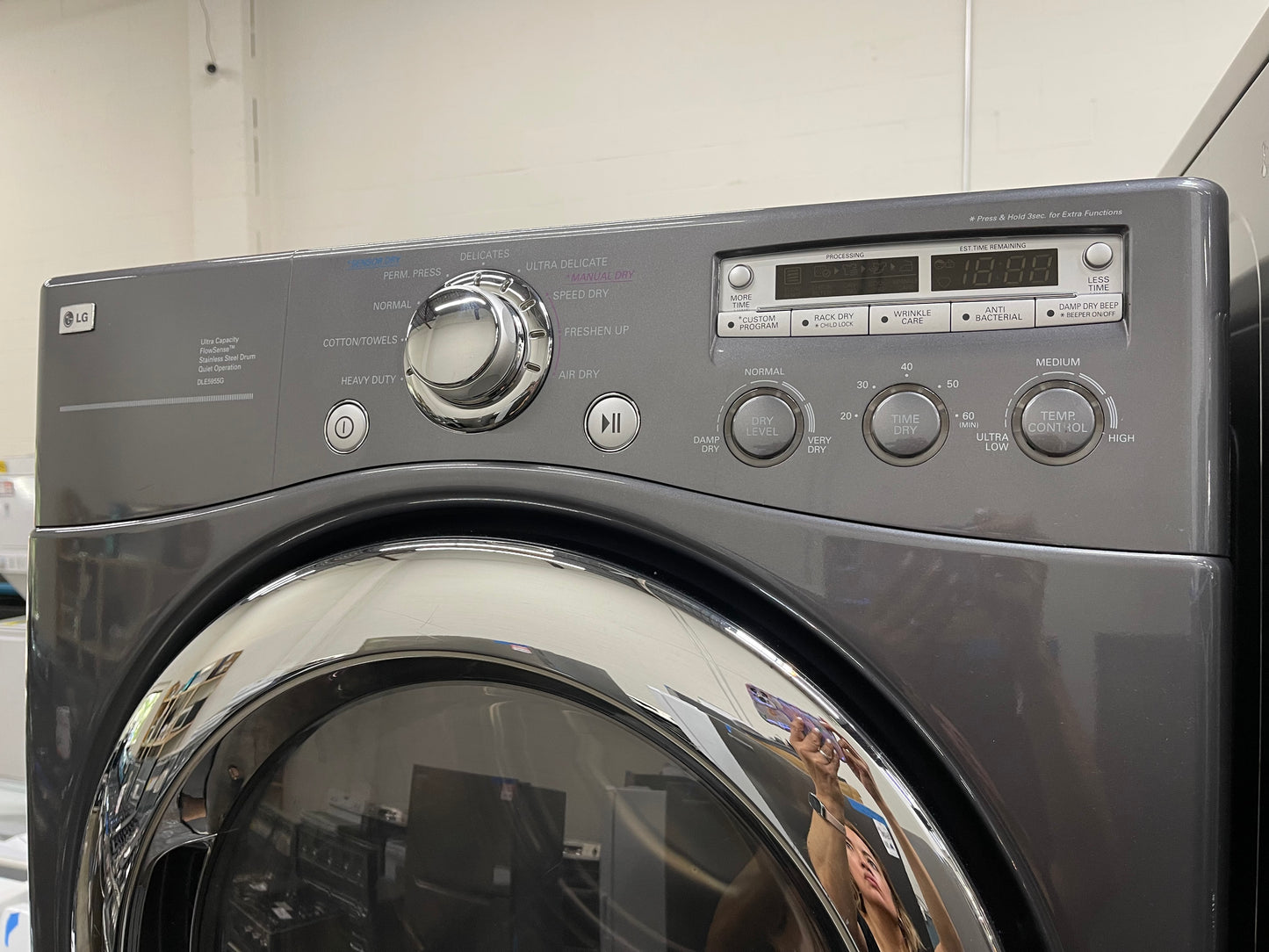 LG  WM2455HG
27 Inch Front-Load Washer with 4.2 cu. ft. Capacity and LG  DLE5955G
27 Inch Electric Dryer with 7.3 cu. ft. Capacity