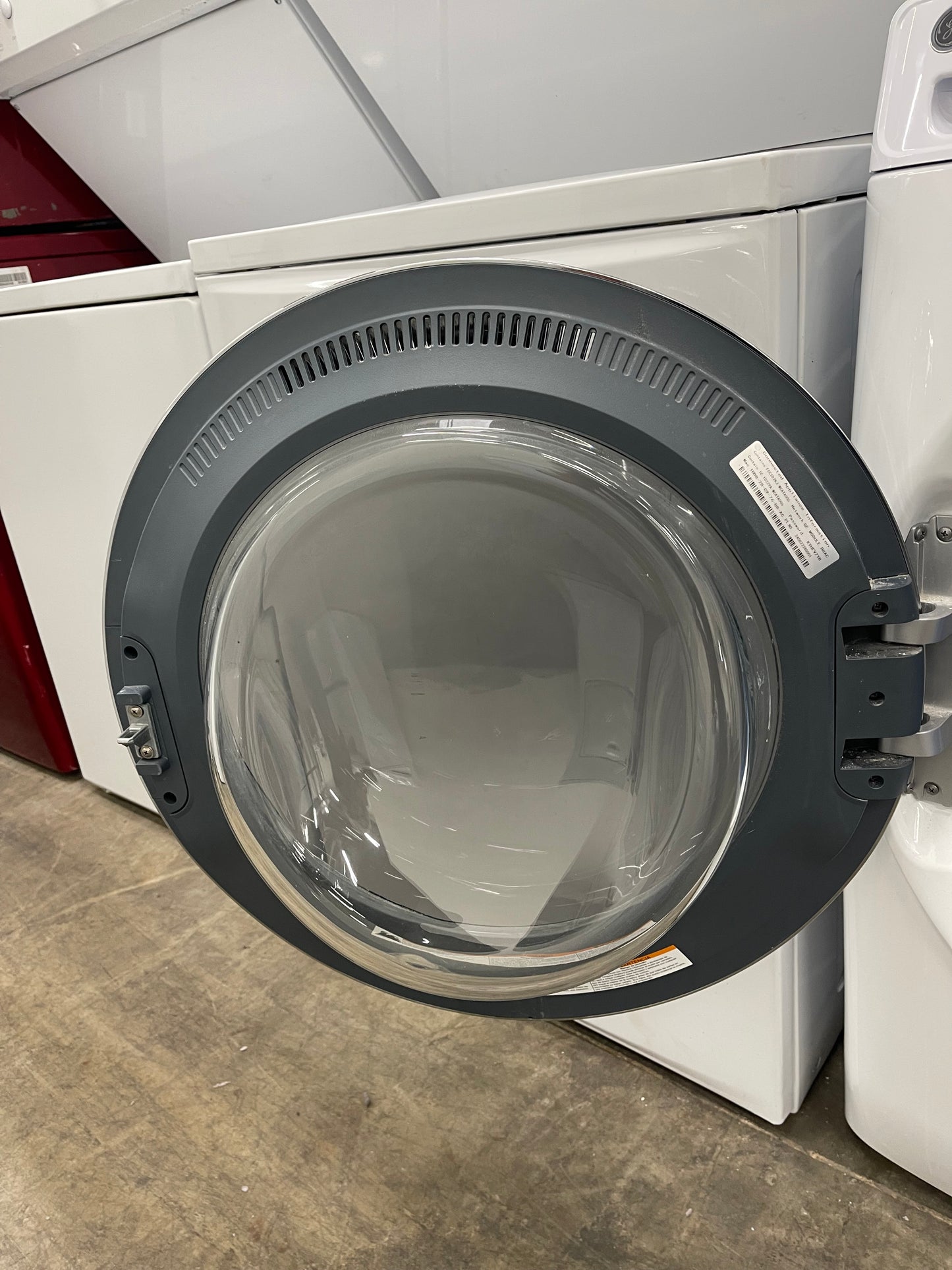 GE GFW650SSNWW Front Load Washer & GFD65ESSNWW Electric Dryer