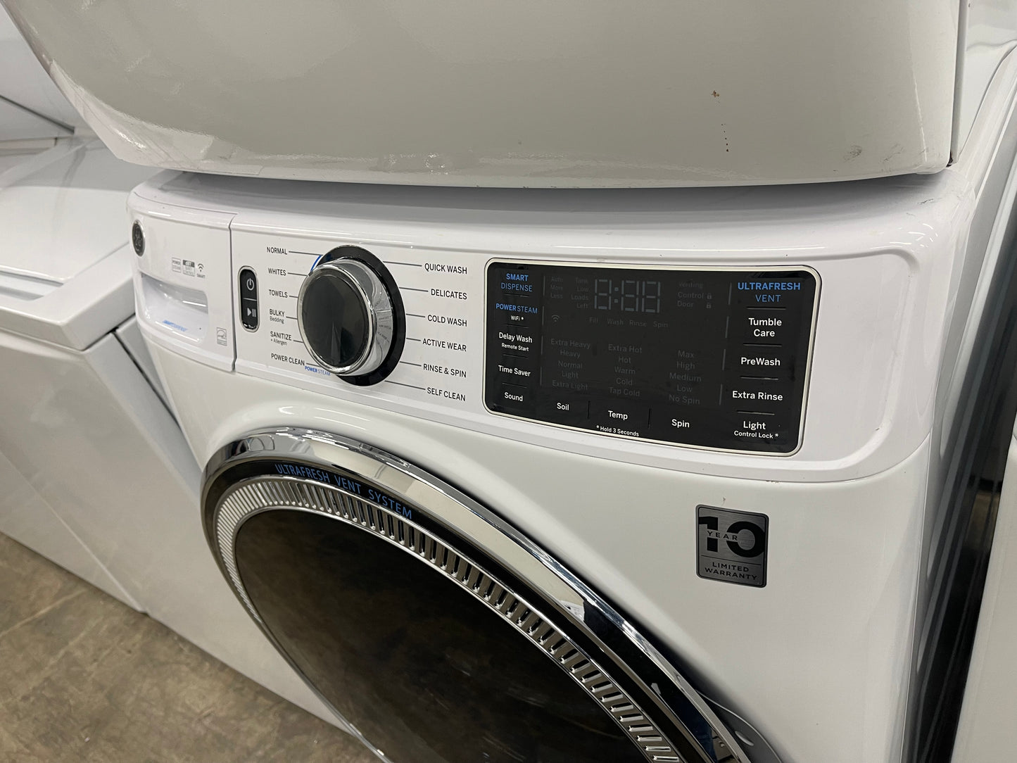 GE GFW650SSNWW Front Load Washer & GFD65ESSNWW Electric Dryer