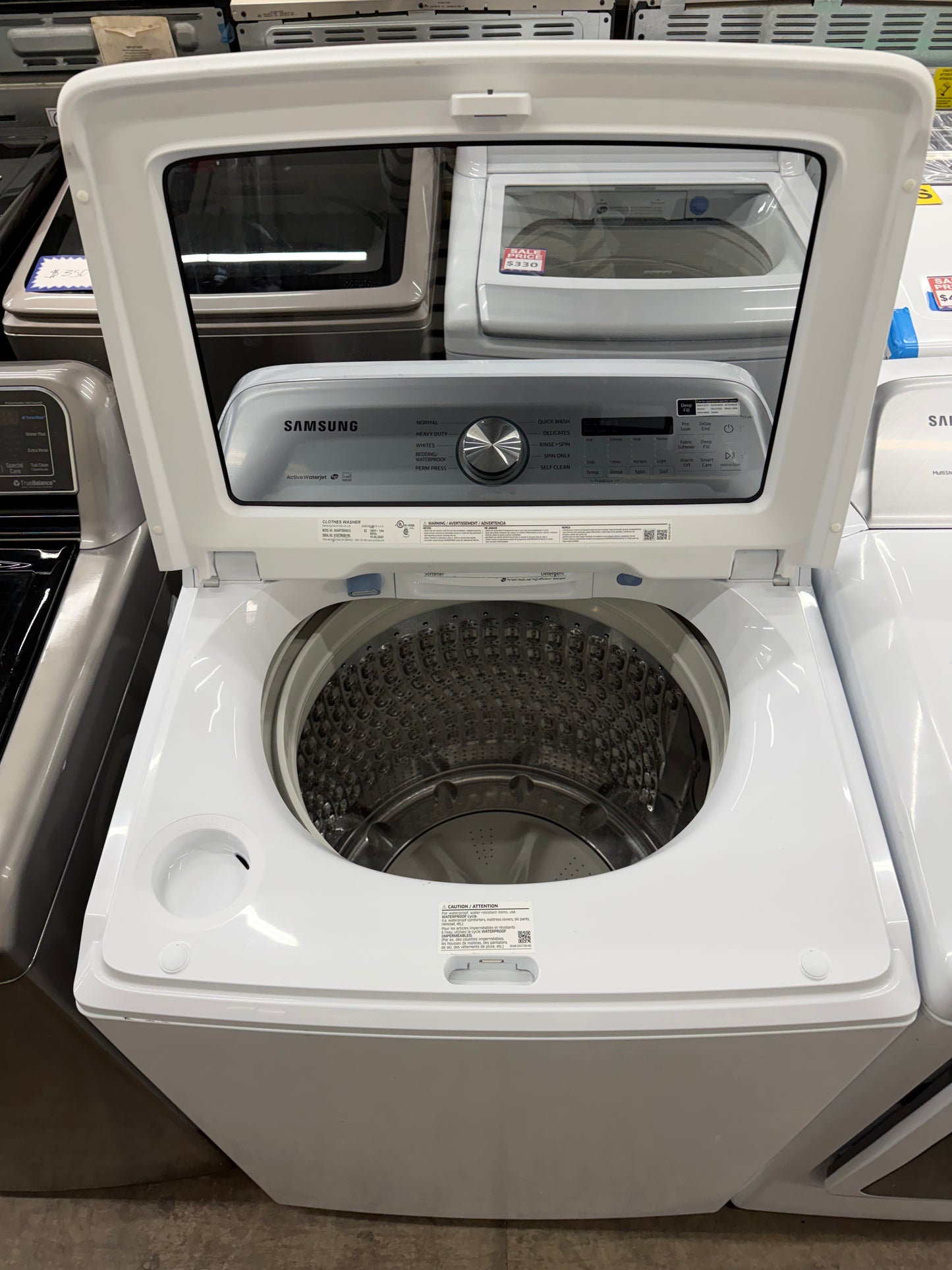 Samsung 5.4 cu. ft. Top Load Washer and 7.4 cu. ft. Electric Dryer