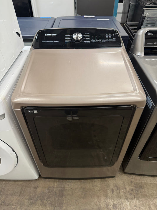 Samsung  DVE52A5500C
27 Inch Electric Smart Dryer with 7.4 cu. ft. Capacity, Steam Sanitize+, Wi-Fi Connectivity, 18 Drying Cycles, Sensor Dry, Smart Care, Vent Sensor, Interior Drum Light, and Lint Filter Indicator: Champagne