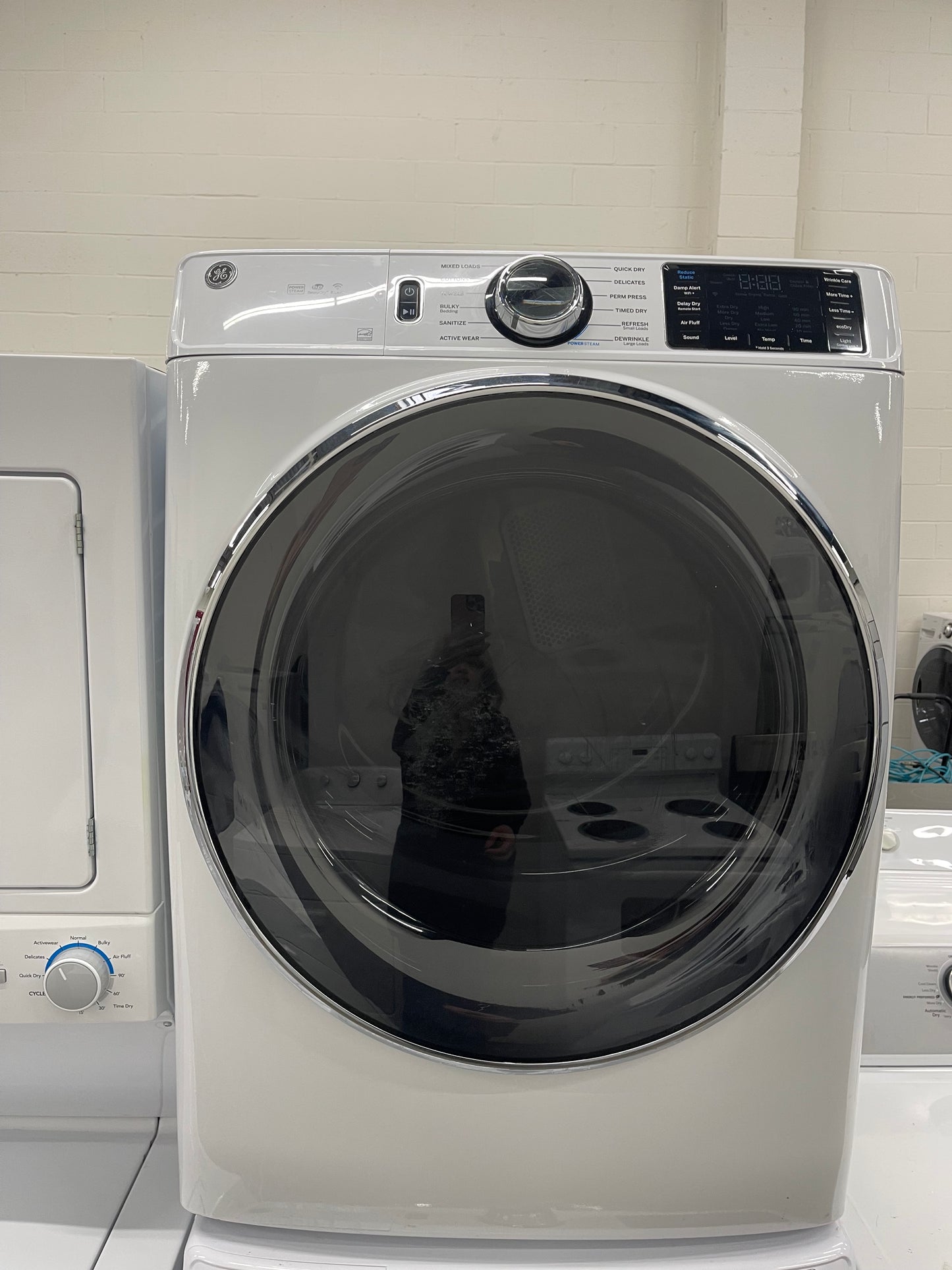 GE GFW650SSNWW Front Load Washer & GFD65ESSNWW Electric Dryer