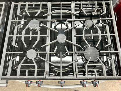 Frigidaire 30-in 5 Burners 5-cu ft Self Cleaning Gas Range in Stainless Steel-Model #FFGF3054TS