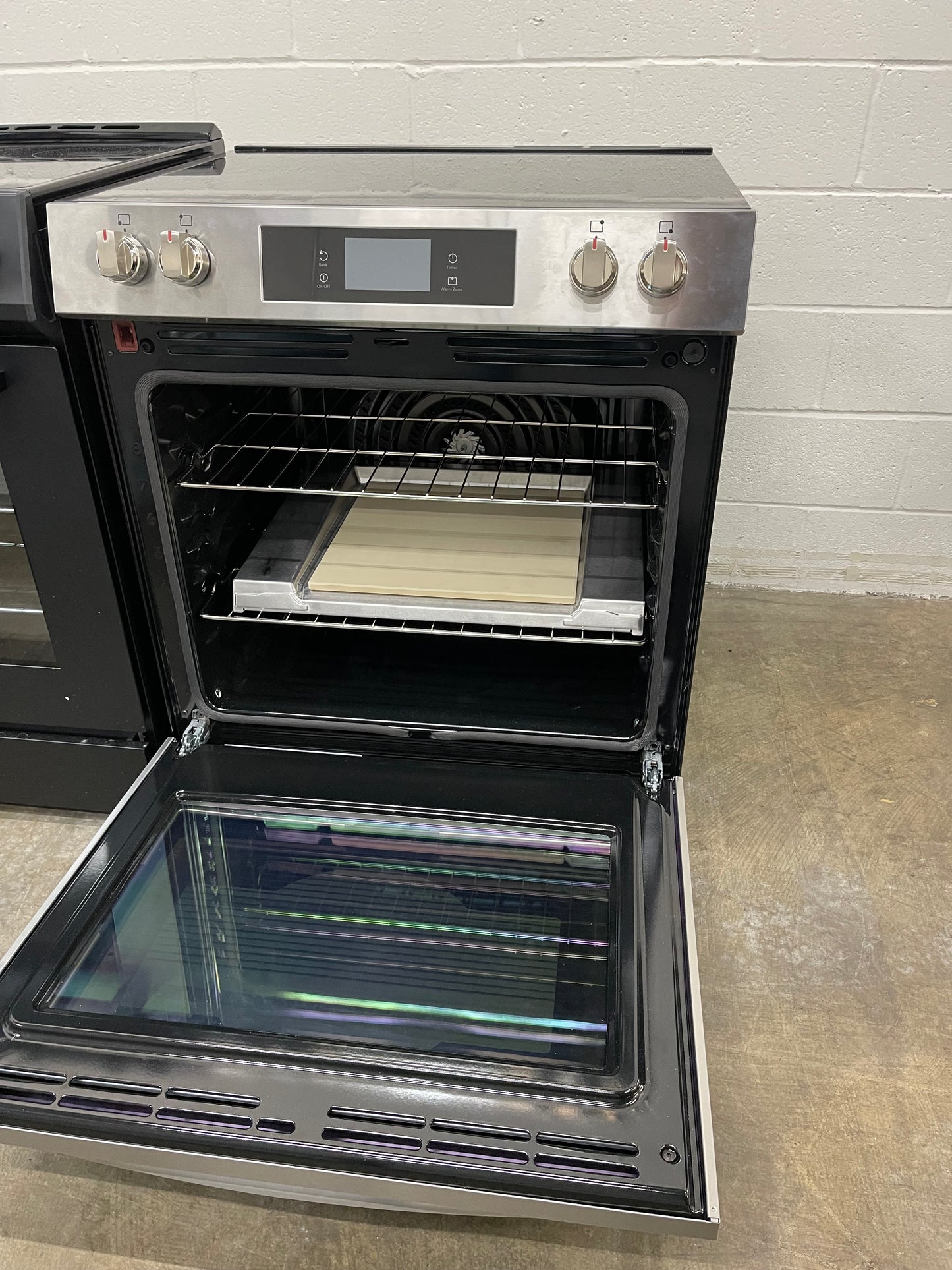 Frigidaire Gallery Series  GCFE3070BF
30 Inch Freestanding Electric Range with 5 Elements, 6.2 cu. ft. Total Convection Oven, EvenTemp™ Element, Storage Drawer, Stone-Baked Pizza, Air Fry, Self & Steam Clean, and Star-K