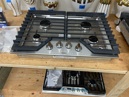 Whirlpool  WCG55US0HS
30 Inch Gas Cooktop with 4 Sealed Burners, EZ-2-Lift Hinged Grates, SpeedHeat Burner, AccuSimmer Burner, Upswept SpillGuard Cooktop, and Dishwasher-Safe Knobs: Stainless Steel