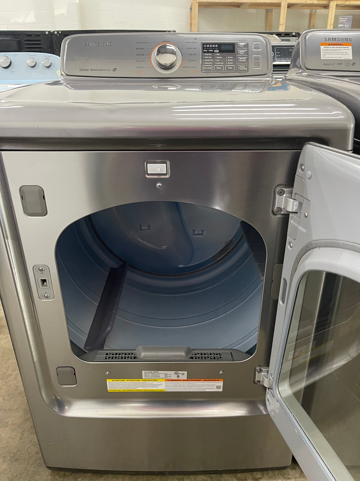 Samsung  WA48H7400AP
27 Inch 4.8 cu. ft. Top Load Washer with 11 Wash Cycles and Samsung  DV48H7400EP
27 Inch 7.4 cu. ft. Electric Dryer with 11 Dry Cycles,