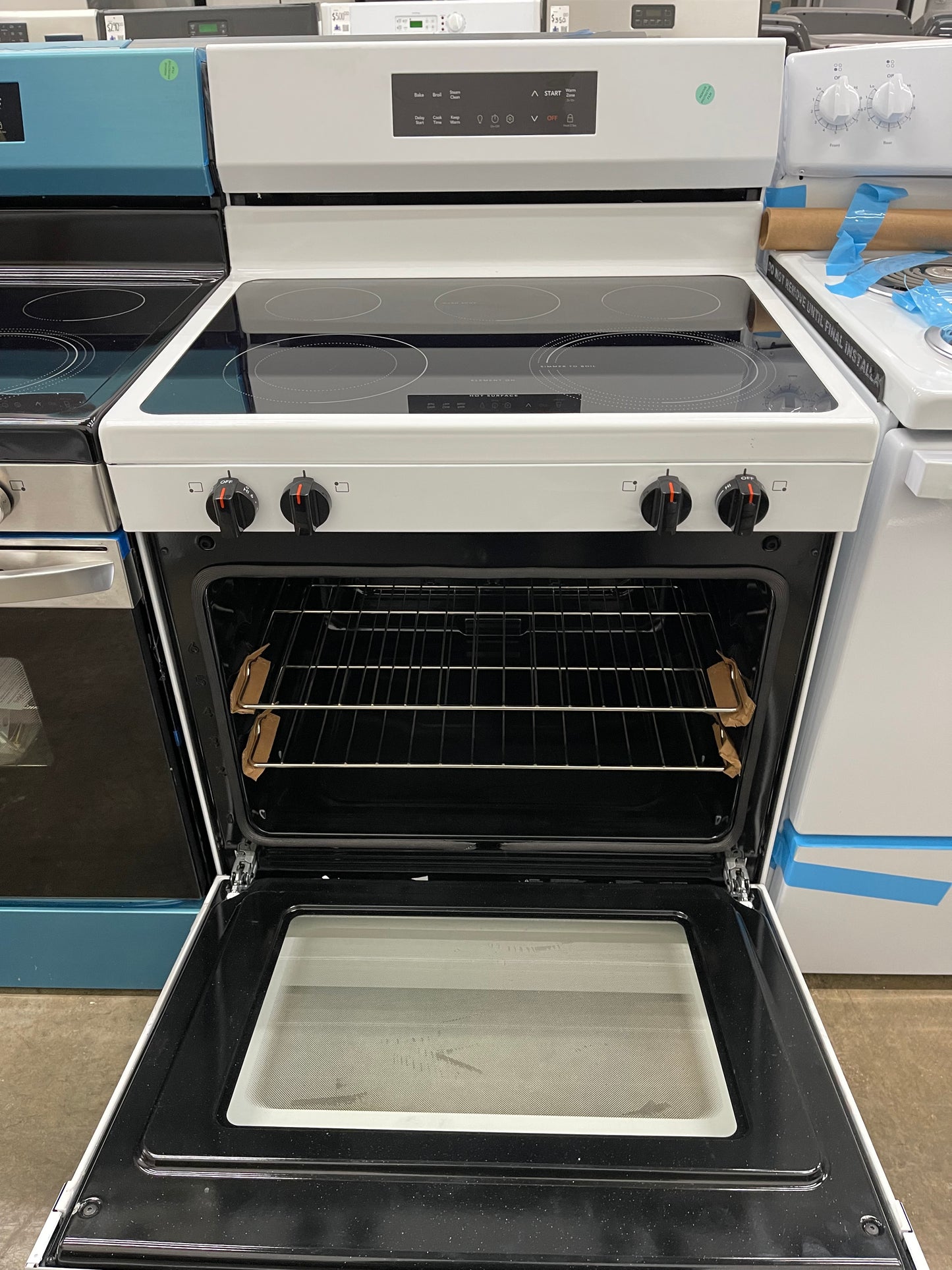 Frigidaire  FCRE3062AW
30 Inch Freestanding Electric Range with 5 Elements, 5.3 cu. ft. Capacity, EvenTemp Element, SpaceWise Element, Storage Drawer, and Steam Clean: White