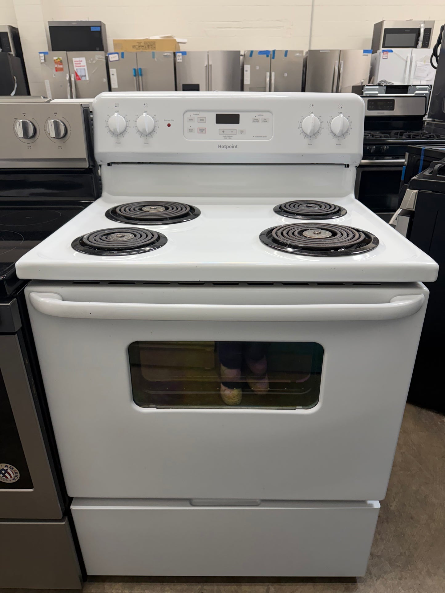 Hotpoint  RBS360DMWW
30 Inch Freestanding Electric Range with 5.0 Cu. Ft. Oven Capacity, Storage Drawer, Cooktop Indicator Light, Sensi-Temp, and Porcelain Cooktop: White