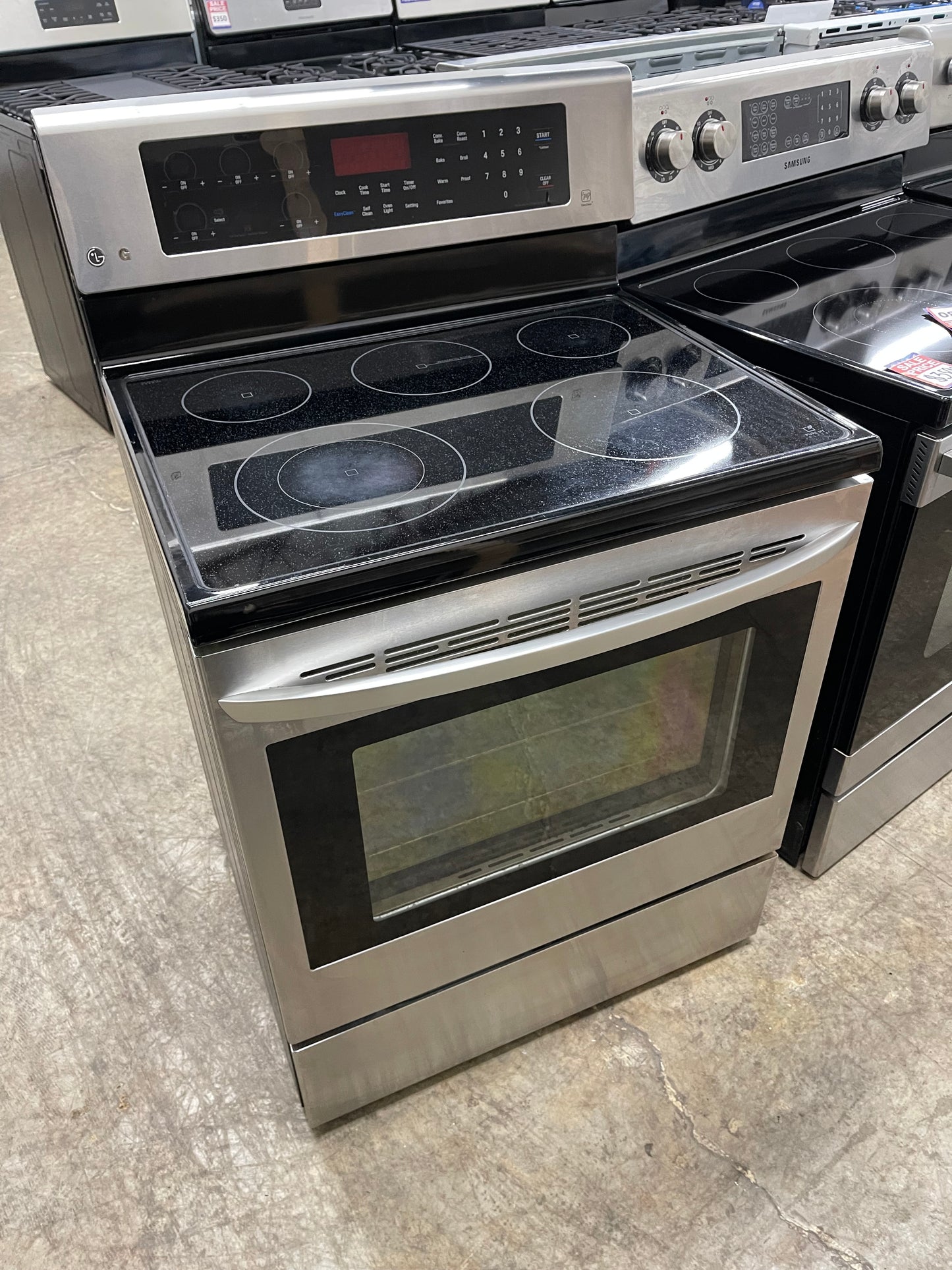 LG  LRE3083ST
30 Inch Electric Range with True Convection, IntuiTouch Controls, EasyClean , 5 Heating Elements, Power Burner, 6.3 cu. ft. Capacity, Brilliant Blue Interior, Storage Drawer and Star-K Certified: Stainless Steel