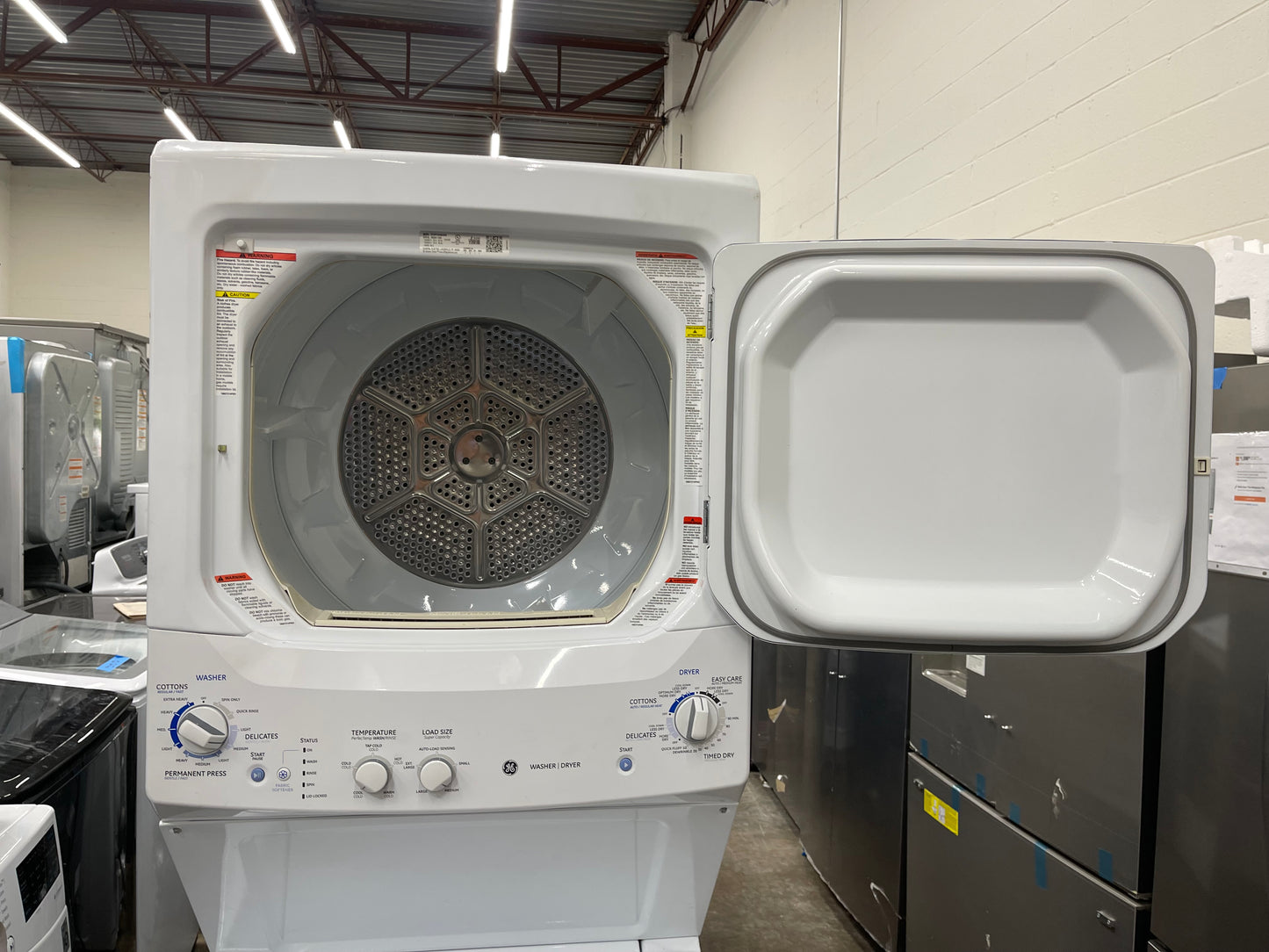 GE Spacemaker  GTUP270EMWW
27 Inch Electric Laundry Center with 3.3 cu. ft. Washer, 5.9 cu. ft. Dryer, 9 Wash Cycles, 4 Dry Cycles, Auto-Load Sensing and Cycle Status Lights